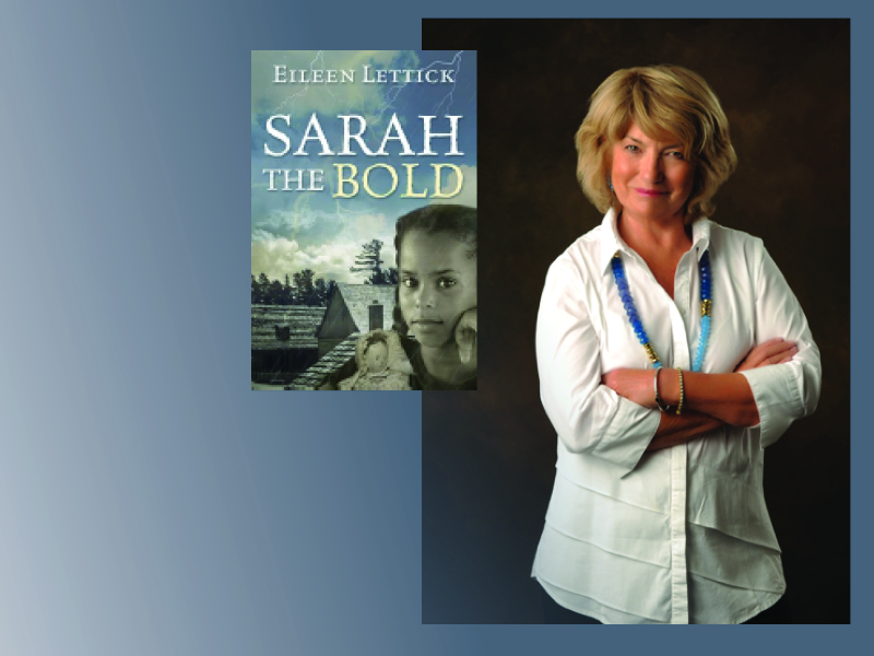 A person with her arms crossed in front of a book titled Sarah the Bold.
