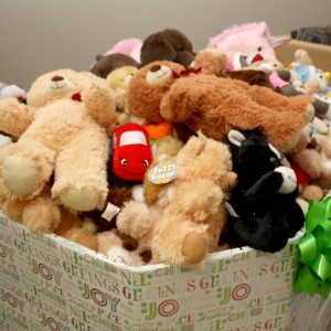 Donation box filled with stuffed animals.