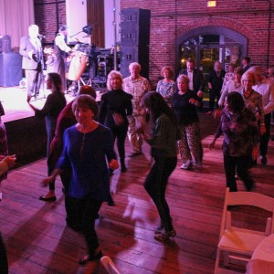 People dancing to a band.
