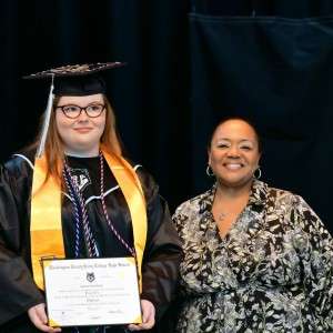 person with diploma