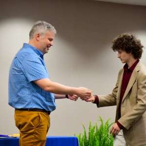 Person receiving award