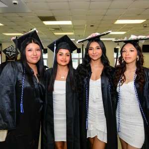 4 girls in cap & gown