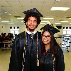 Man & woman in cap & gown