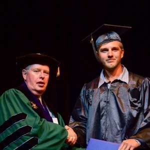 2 men shaking hands
