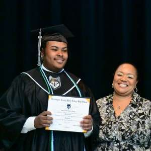 Certificate and 2 people