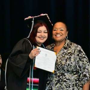 2 women with a diploma