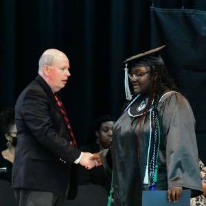 Shaking hands on stage