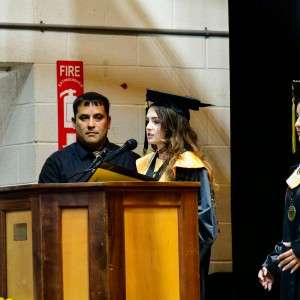 man & woman at podium