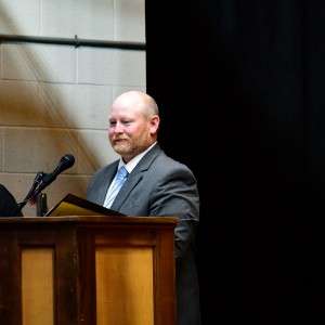 Man at podium