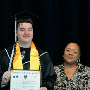Student with diploma