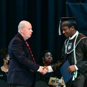 2 men shaking hands