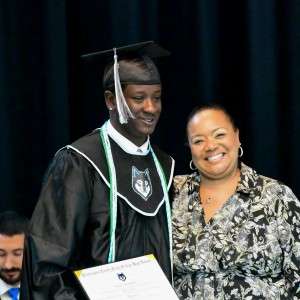 Diploma and 2 people