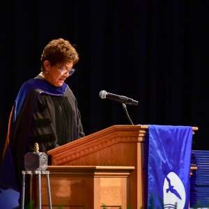 Woman at podium