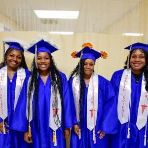 Group of people with graduation garb.