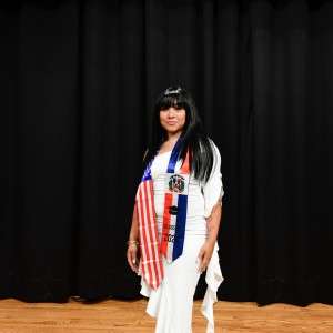 Person with academic ribbons
