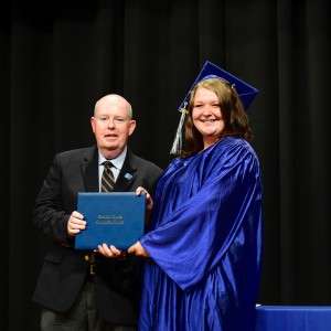 2 people with certificates