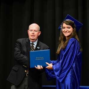 Man & woman with certificate