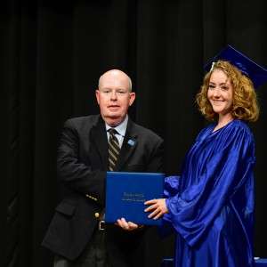 ,man & woman with diploma