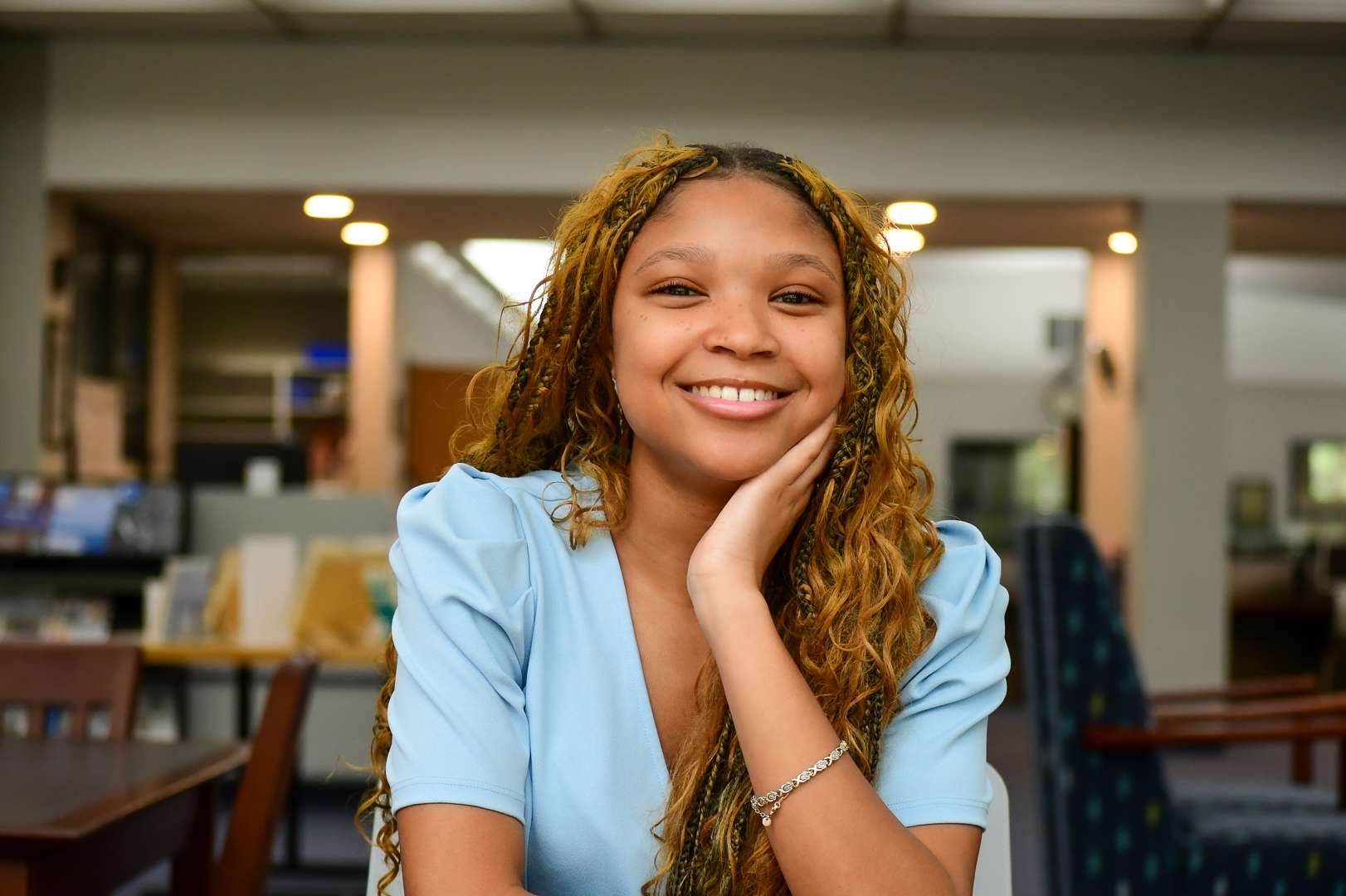 Female student looking thoughtfully into camera