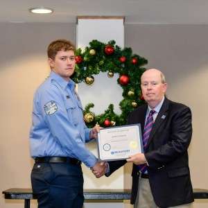 2 men holding certificate