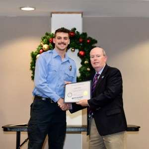 Man holding certificate