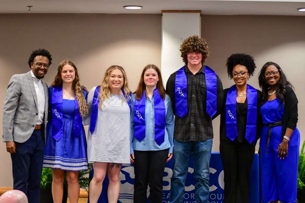 Group of people receiving award