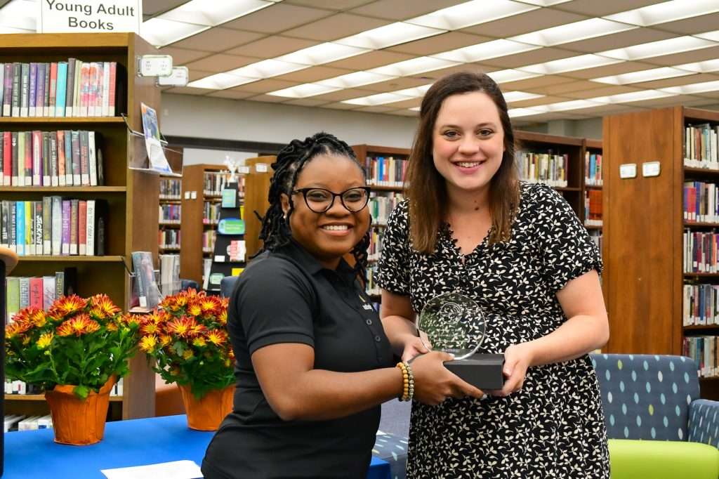 Woman receiving award