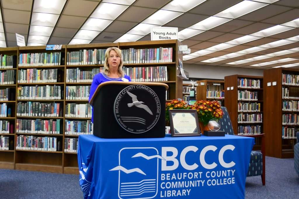 Woman at podium