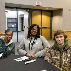 3 people at a table