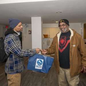 2 men and a bag