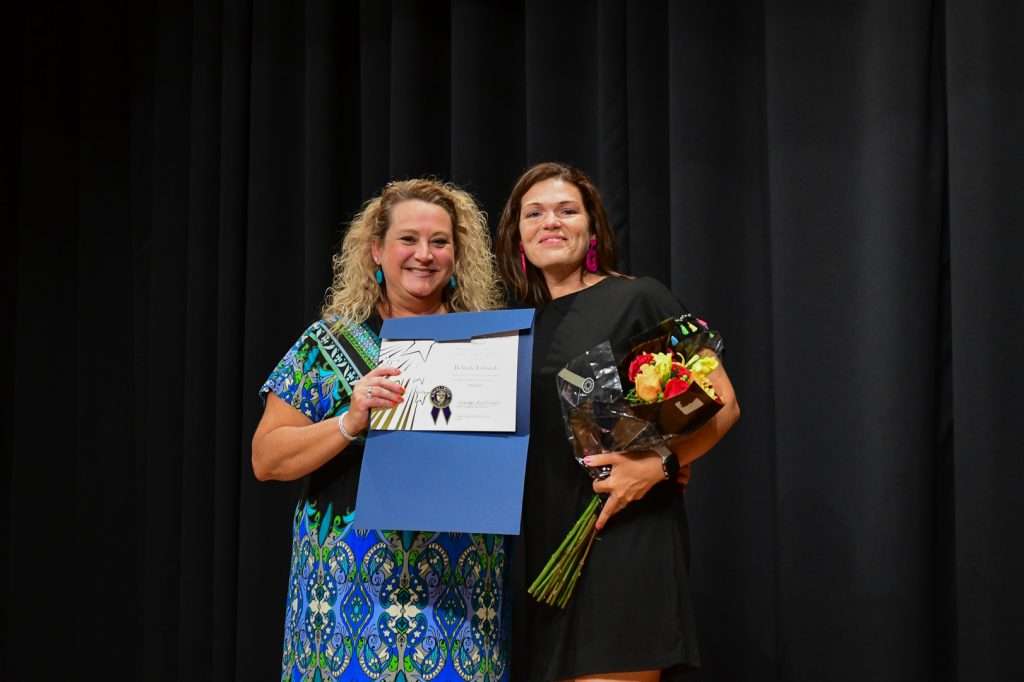 2 women and a certificate