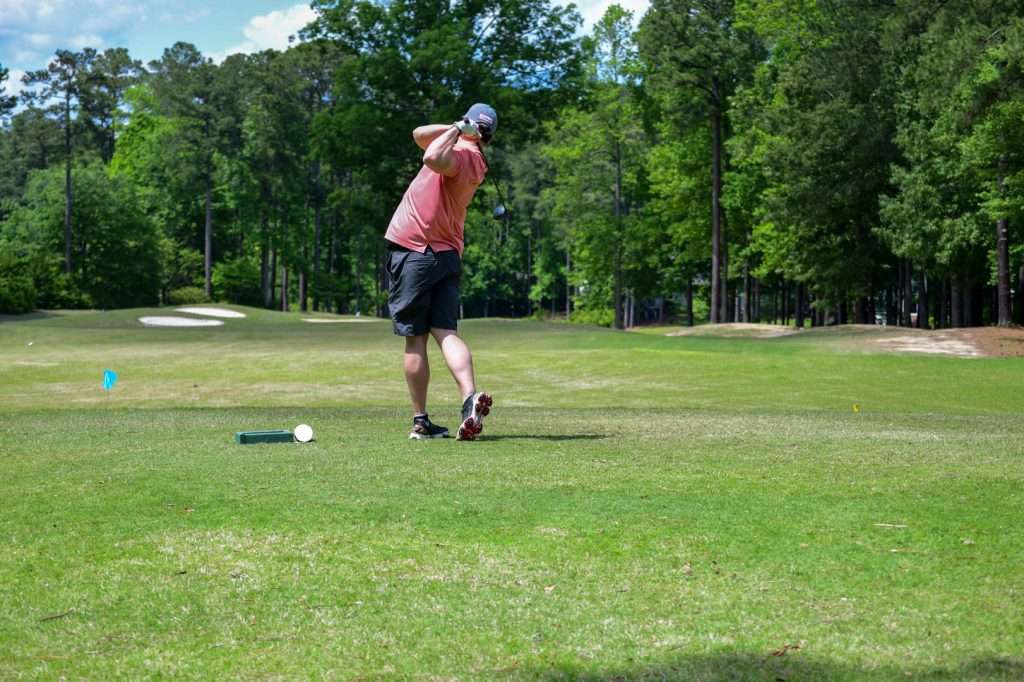 man golfing