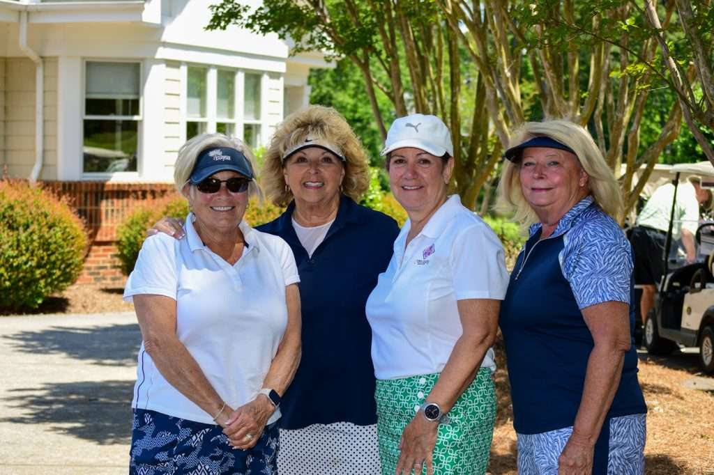 4 female members of golf team