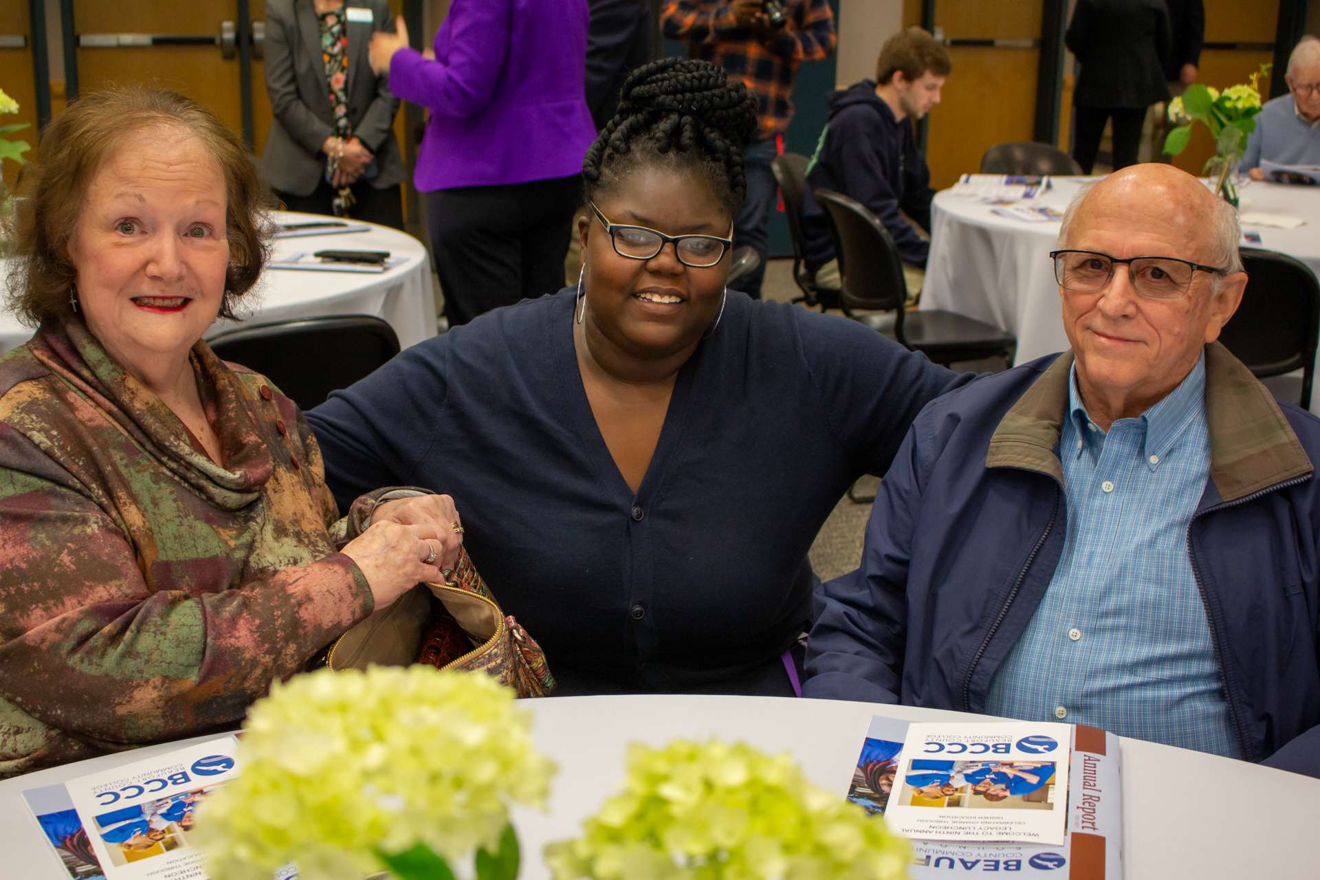 three people at a table