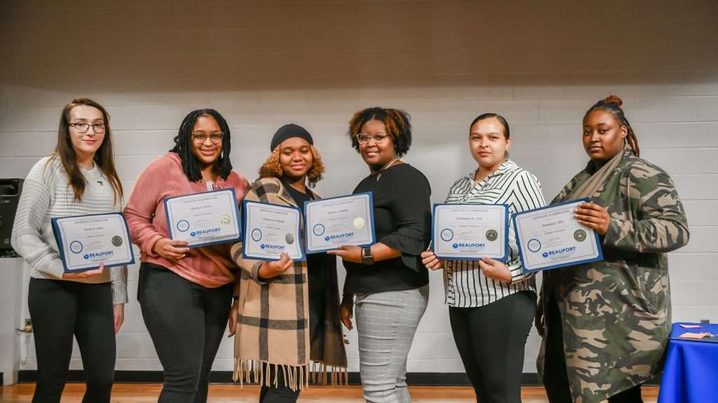 6 people with certificates