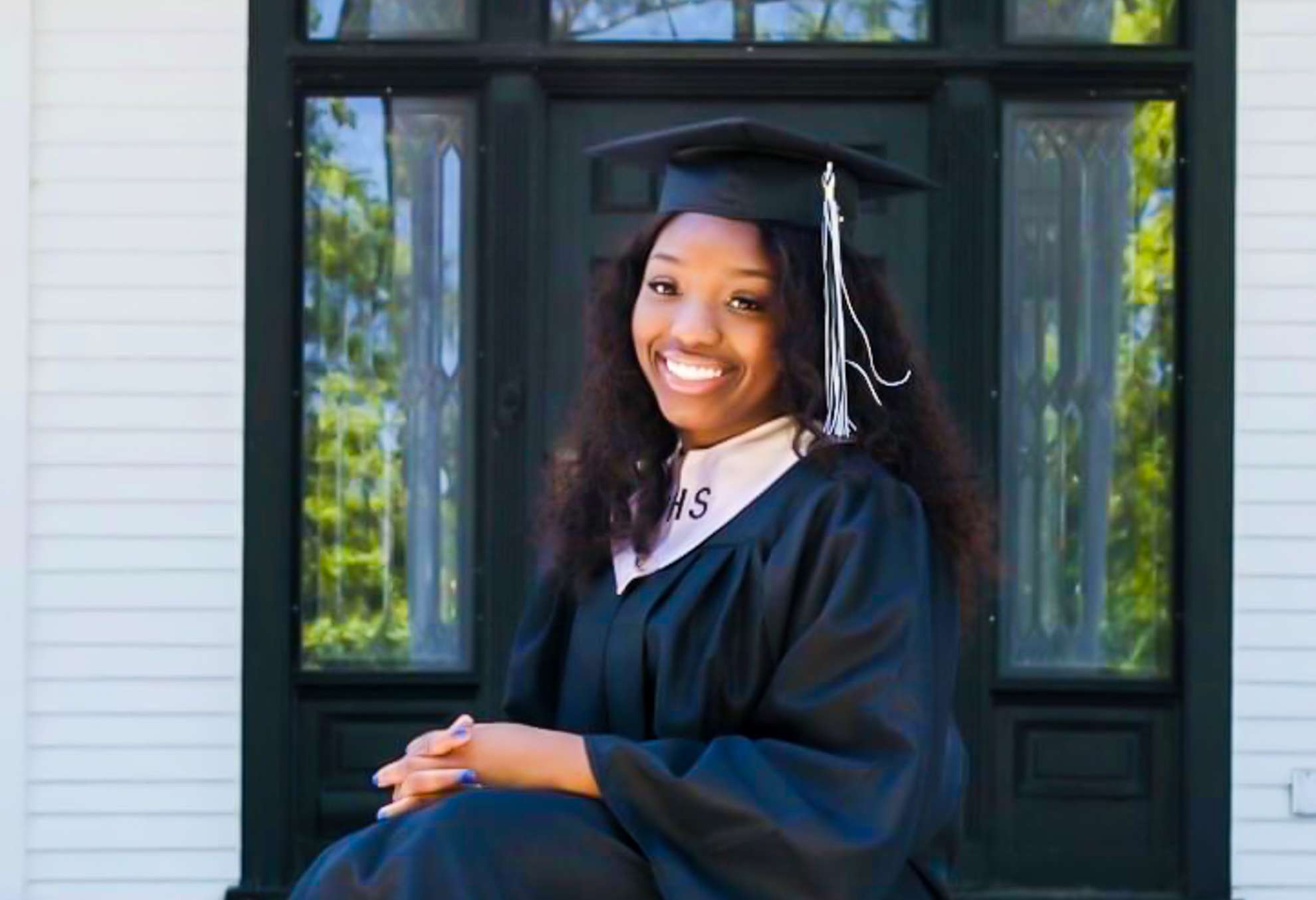 A student in front of a door