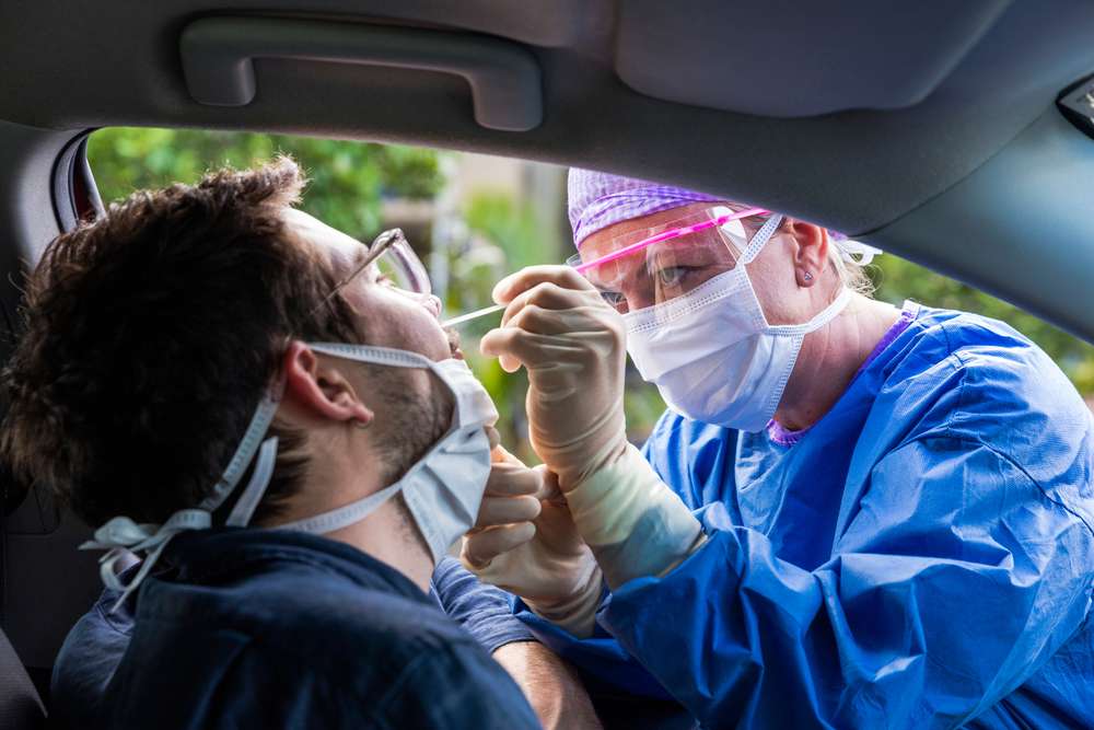 a person getting a nose swab