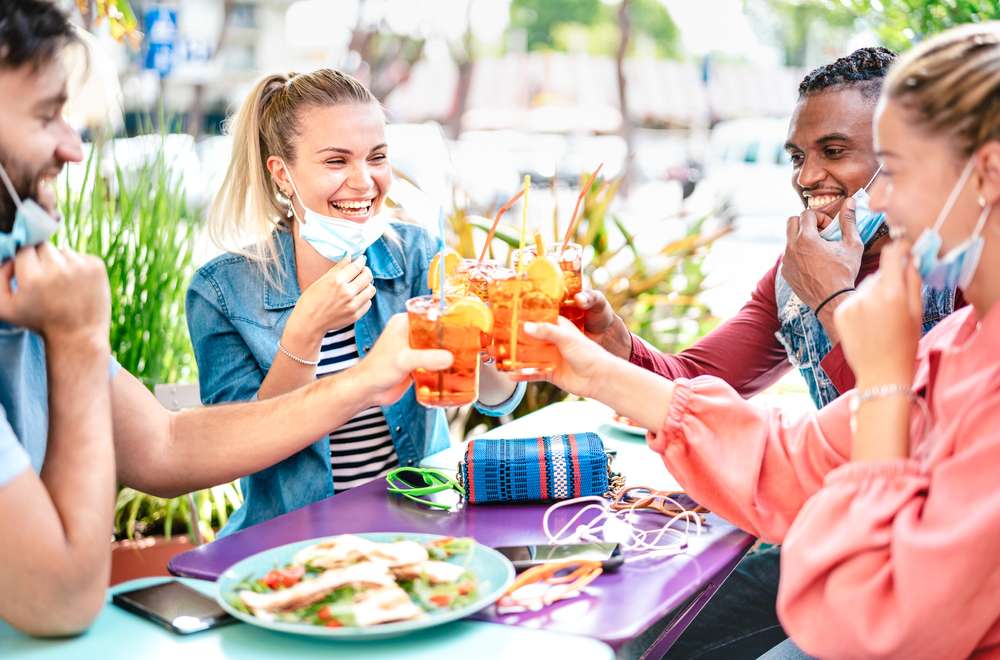 people toasting at a table