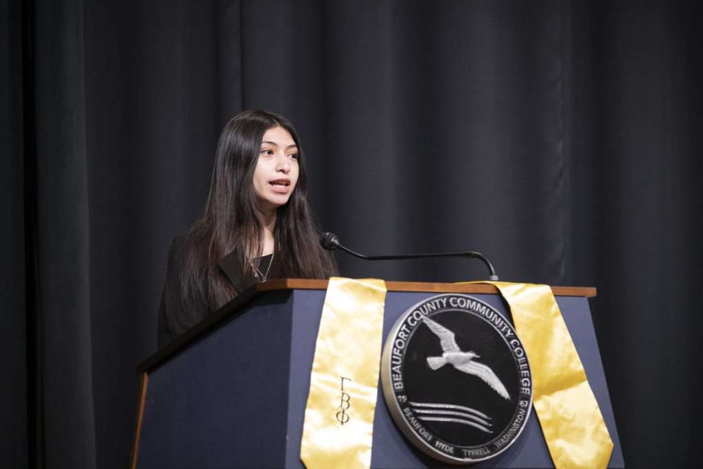 Woman at podium
