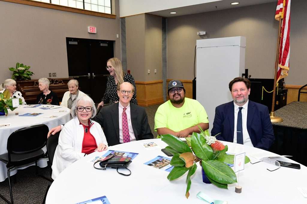 four people at a table