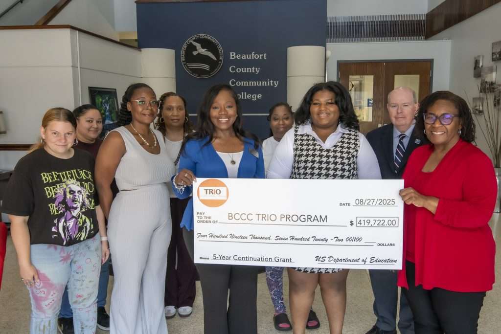 group with a large check