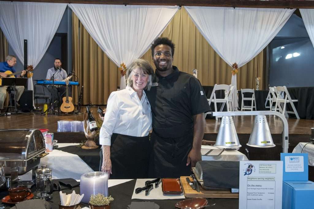 2 people in front of food