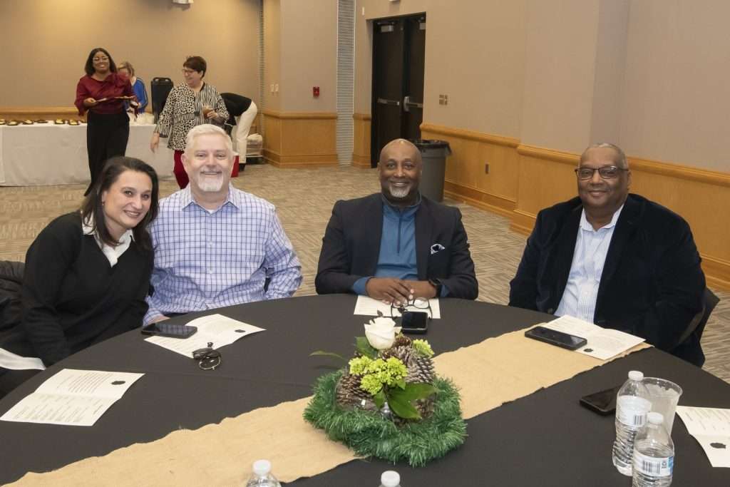 four people at table