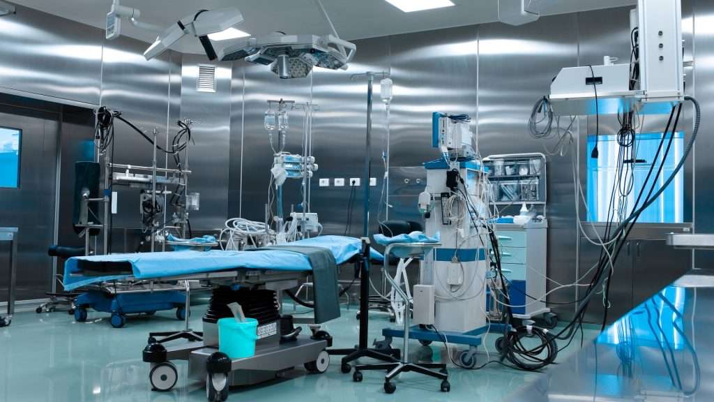 an operating room with lots of equipment