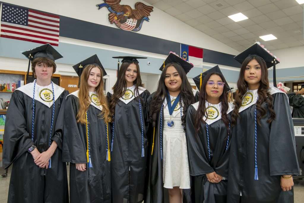 six people at graduation