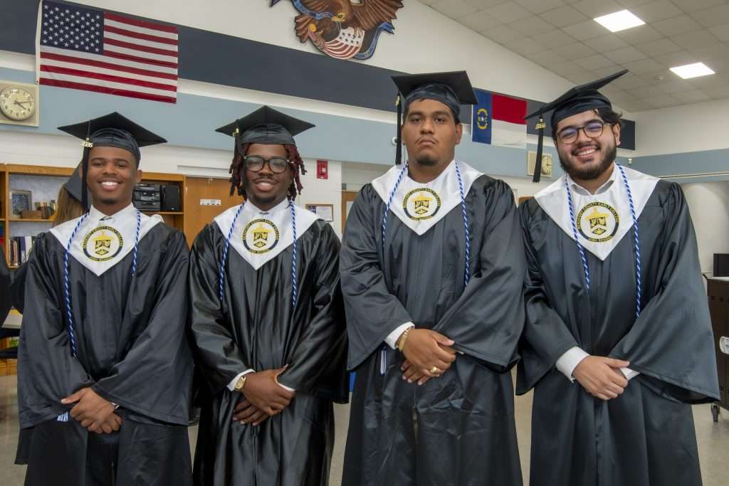 Four graduates