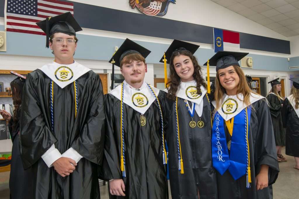 four people at graduation