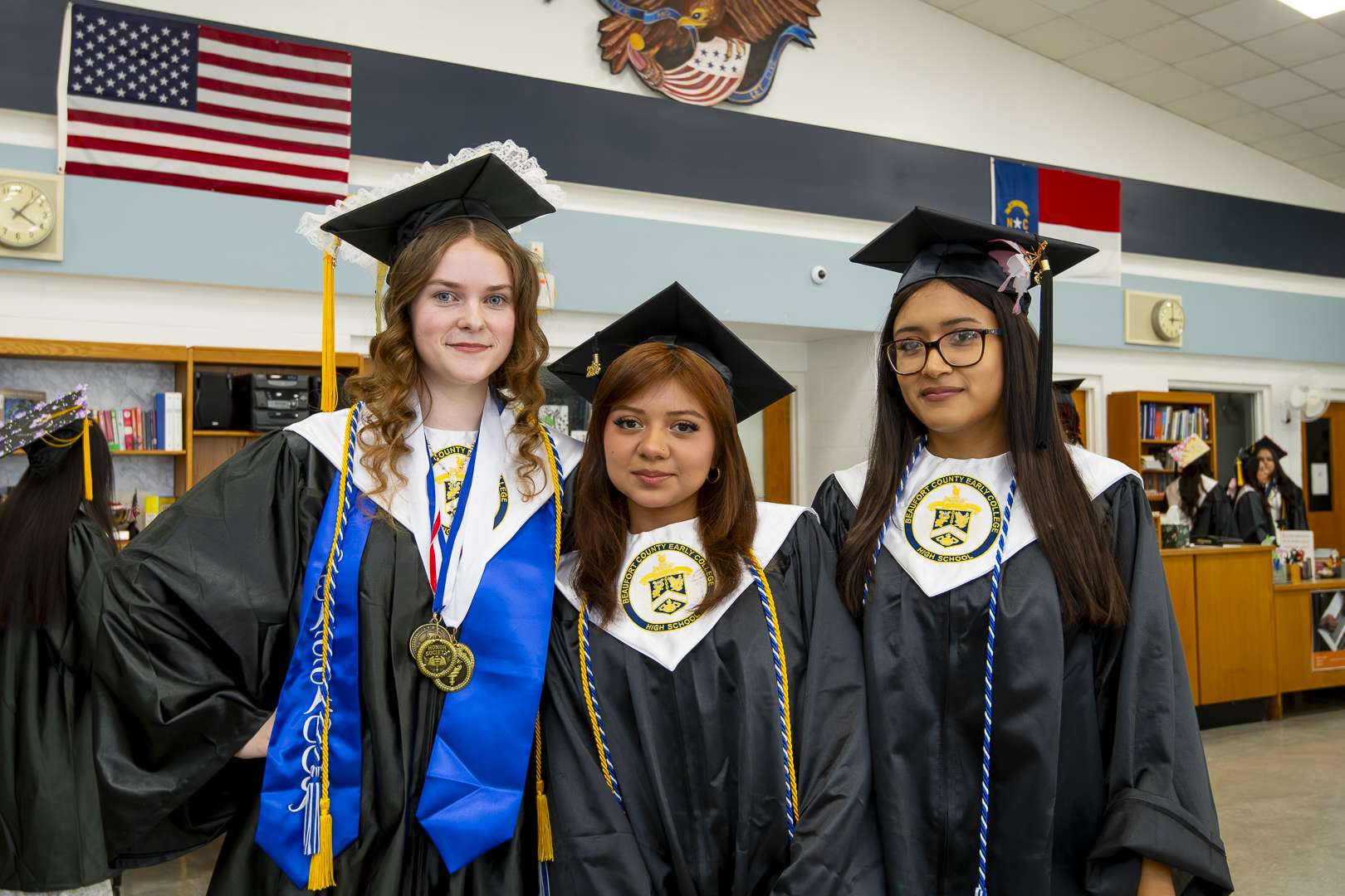 three people at graduation