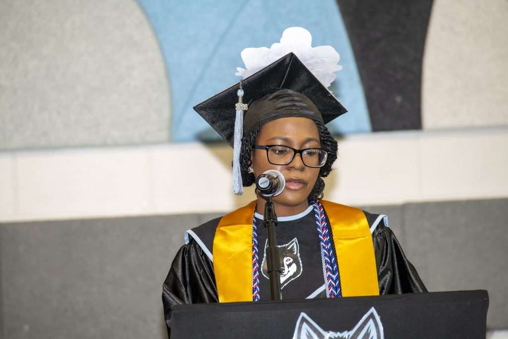 graduate at a podium