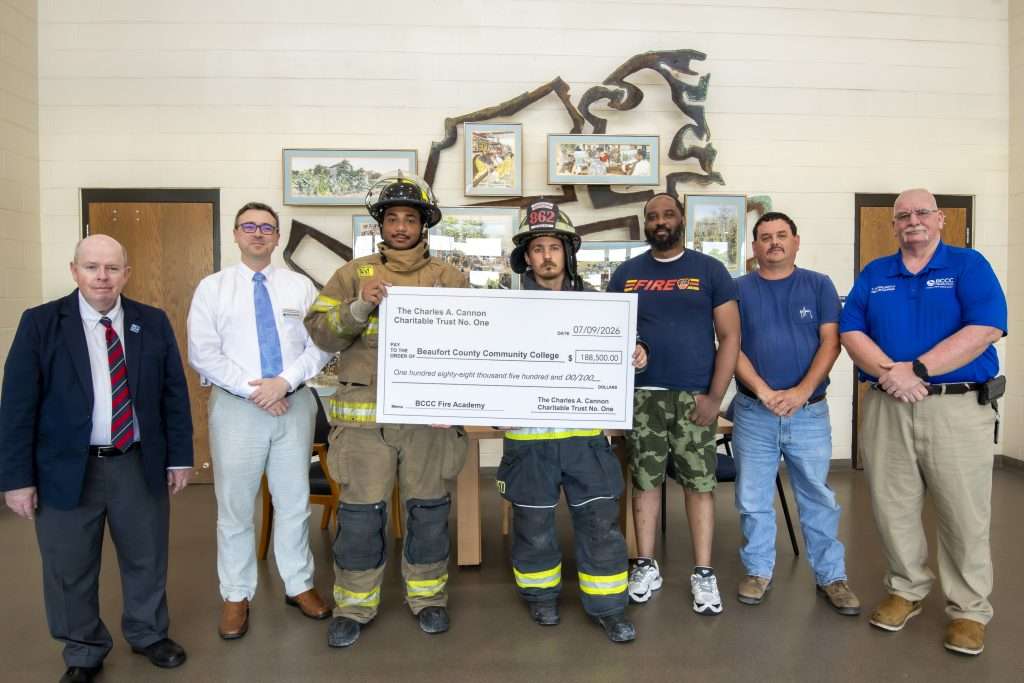 people with a big check